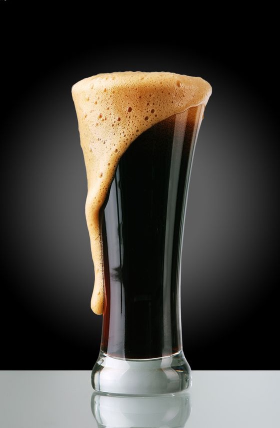 14323188 - glass of dark beer with froth